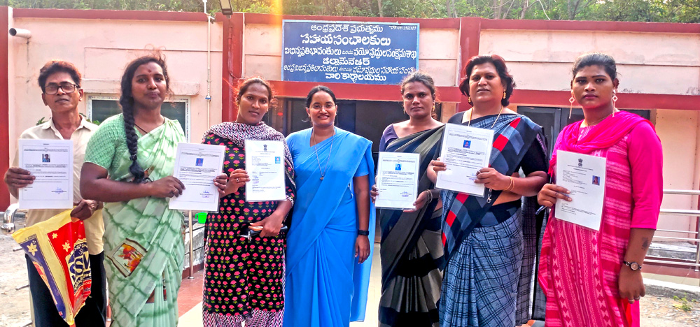 The sheet that they are holding is their transgender Identity card and certificate.