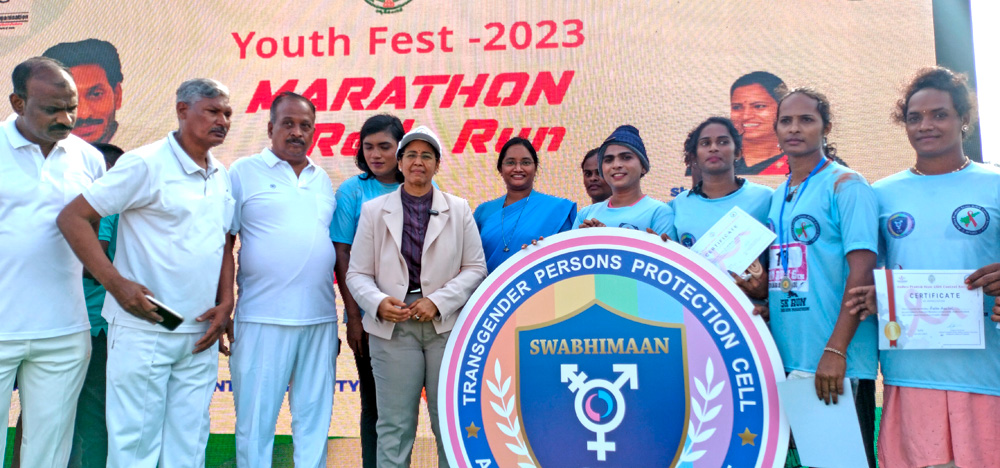 Students with blue sports dress take part in transgender marathon